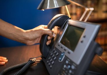 How did the invention of the telephone affect business.